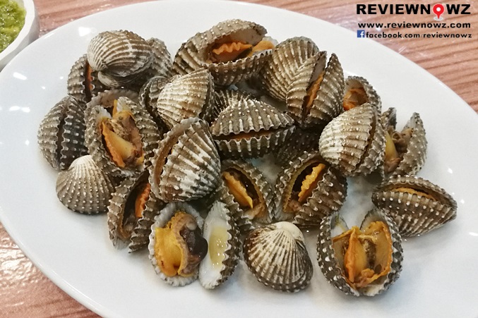 Poached cockles